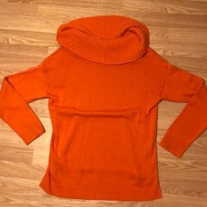 Orange turtleneck sweater